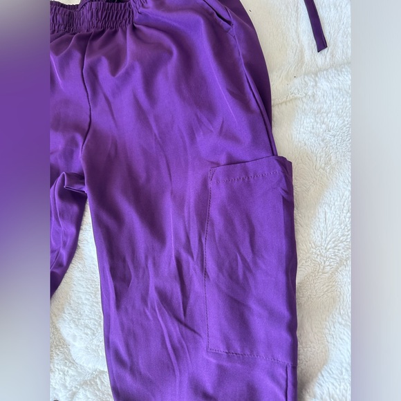 Scrubs. Purple and have matching pairs. - Picture 3 of 4